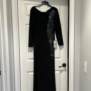 Size 10 3/4 sleeve black formal Dress with sequins and studs on one side